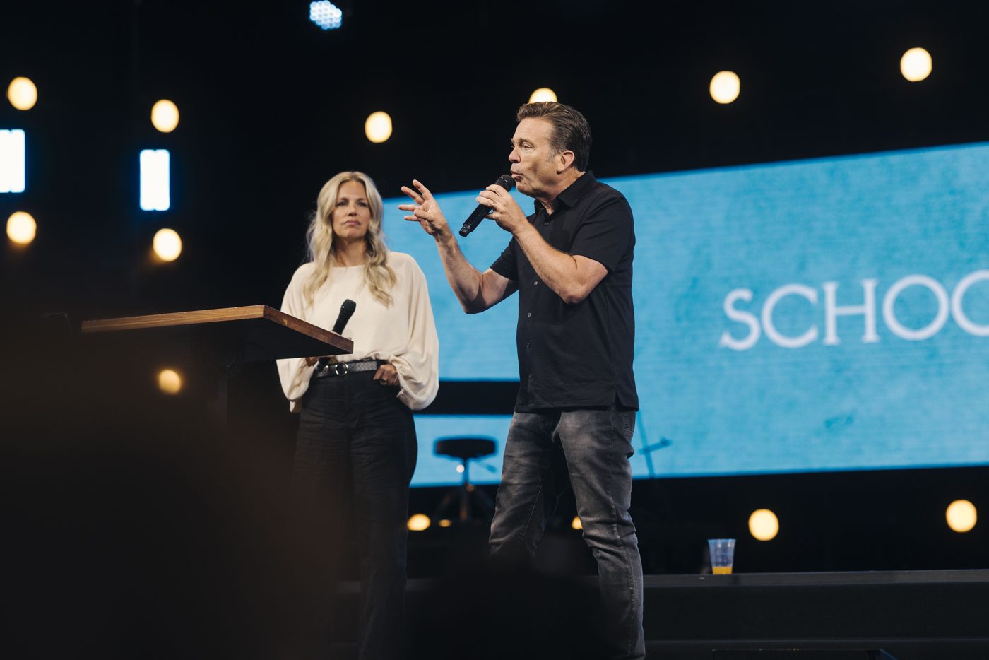 Dano McCollam and Bethany Hicks teaching on stage at School of Prophetic Training