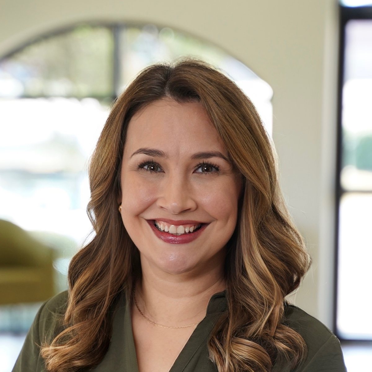 Portrait of Nikki Comolli, master trainer.